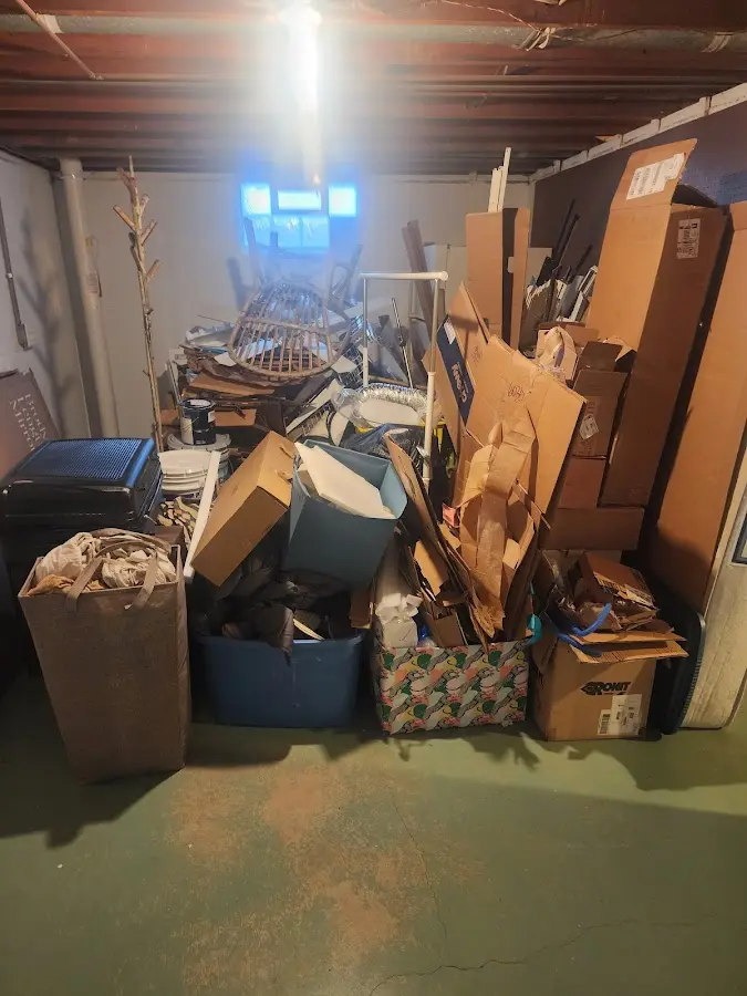 Roll-off dumpster container at job site for Yard Waste Dumpster Rental in Sage